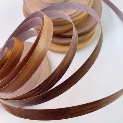 China Eco-friendly Customized Natural Leather Covered Edge Black Walnut White Oak Veneer Edge Sealing Strip Sealing 0.5mm Wood Dark Edging for sale