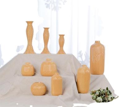 China Modern European Christmas Gifts Living Room Flower Tabletop Fold Paper Shaped Scandinavian Ceramic Luxury Vase Ornaments for sale