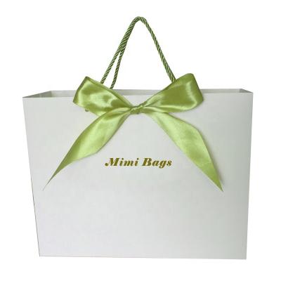 China Sentork Recyclable Custom Gold Foil LOGO Luxury Gift Bags Shopping Bags Clothing Packaging Paper Bags for sale