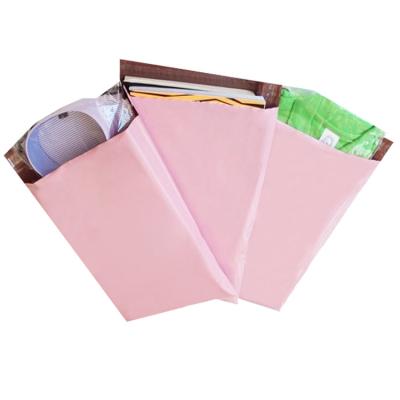 China Waterproof Strong Adhesive Mailing Bag Messenger Mailer Bag Custom Printed Light Pink Postage Mailing Bags for sale