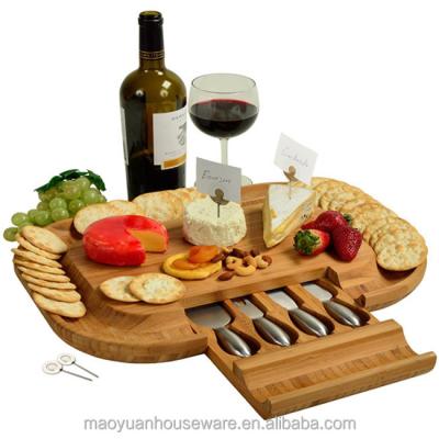 China Sustainable Oval Bamboo Cheese Board Set Includes 4 Piece Knife Set Wholesale for sale