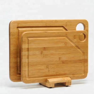 China Sustainable Material 2pcs High Quality Bamboo Cutting Board Set With Stand for sale