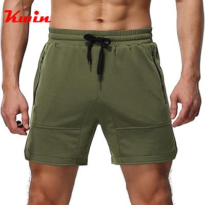 China Custom Men's Gym Workout Anti-Wrinkle Shorts Casual Elastic Waist Gym Summer Beach Sporty Shorts With Pockets for sale