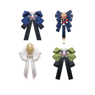 China Fashionable Art Beauty Head Flower Tassel Heart Shape Crystal Snowflake Brooch Bow Tie Lady Christmas Silk Cloth Brooch Creative Baroque for sale