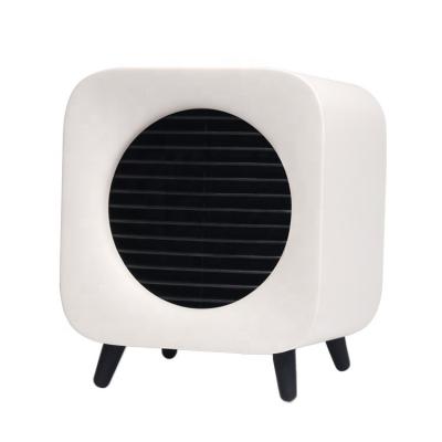 China High and Low Temperature Mode Desktop 220V Bedroom Free Standing Space Small PTC Heater Fan for sale