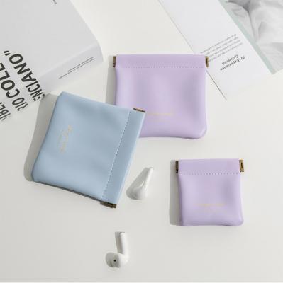 China Light Fashionable Luxury Cosmetic Airpods Mini Portable Storage Leather Bag with Magnetic Seal for sale