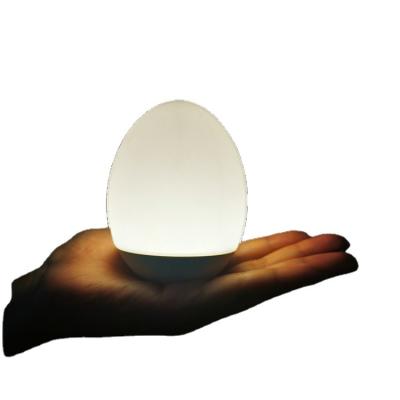 China Modern Creative Rocker Mood Light Rechargeable Table Lamp Small RGB Colored Dimmable Warm White Cute Egg Night Light For Kids for sale