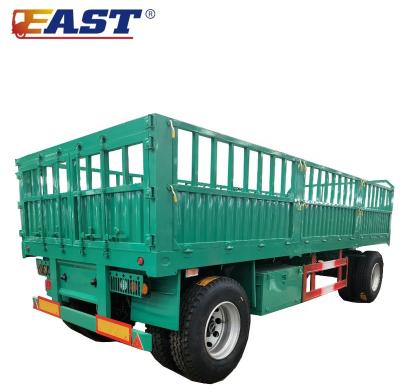 China Dropside EAST direct drawbar full truck trailer factory trailer with stake farm tractor trailer full barrier cargo trailer for sale