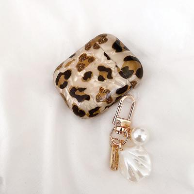 China Luxury Withpearl Key Chain Flame Leopard Print IMD Earphone Case For Airpods 1 pro 2 3 Cover With Metal Pearl Key Chain for sale