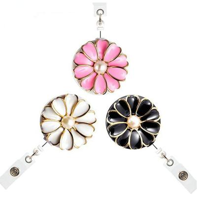 China Wholesale Metal Rotating Crystal Flower Retractable Badge Reels Women Alligator ID Badge Revolving Clips for sale