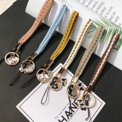 China Wholesale Short Cloth Fabric Key Chain Bracelet Woman Fashoin Braid Pendant Lanyard Wrist Phone Strap Flower for sale