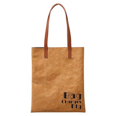 China Rope Handle Vintage Reusable Tote Bags Texture Paper Waterproof Shopping Bag Custom Logo for sale