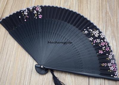 China 22cm Carving Black Japanese Hand Fan Handmade Decorative Folding Fans for sale