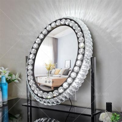 China Desk Oval Vanity Lighted Led Mirror Color Changing Makeup Light Crystal Mirror Dressing Table Makeup Mirror for sale