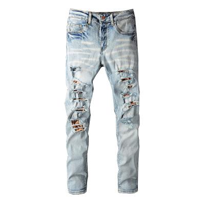 China Amiry Breathable Mens Fade Custom Skinny Fit Jeans With Cropped Patch Over The Knee And Ripped Patch Details Individuality Fashion Pants For Men for sale