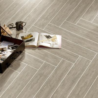 China Rustic Tiles Foshan Wood Look Matte Outdoor Non-slip Porcelain Tiles Uses In Bedroom Gray Brown Interior Wood Tile for sale