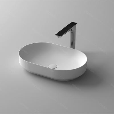 China Durable Modern Oval White Artificial Stone Countertop Drop Down Solid Outdoor Wash Basin Bathroom Sink For Sanitary Ware for sale