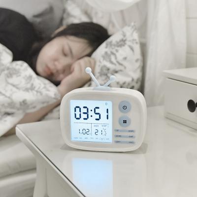 China LUMINOVA Backlight Cartoon Alarm Clock Small Mini Nap Light Square Silence Wholesale Desktop Clock for sale