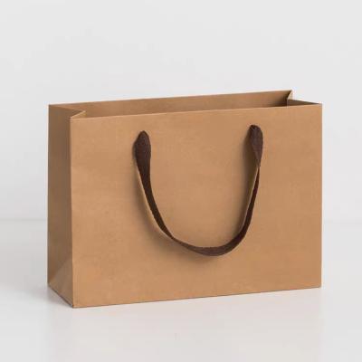 China Recycled Materials Custom Your Own Logo Kraft Paper Gift Craft Clothing Shoes Shopping White Brown Paper Bags With Processing for sale