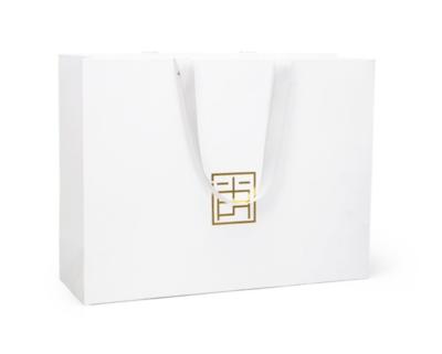 China Recycled Luxury Custom Printed White Black Materials Logo Gold Stamping Garment Gift Paper Shopping Bags With Logo for sale