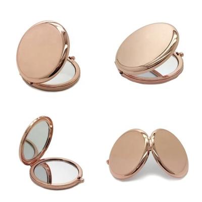 China Personalized Hot Souvenir Round Double Side Metal Pocket Mirror 7cmand6.5cm Gold Plated Make Up Luxury Mirror Customized Logo for sale