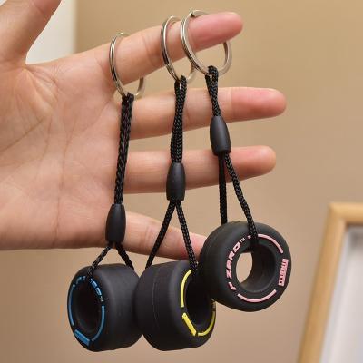 China Key Chain Pendant Accessories Shape Cartoon Six Color PVC Small Tire Key Chain Creative Mobile Phone Bag Car Pendant Key Ring Exquisite Small Gifts for sale