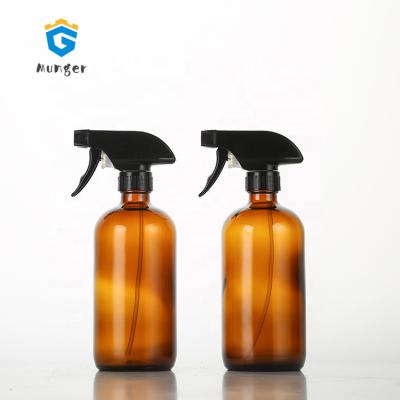 China Personal Care Boston Around 500ML Empty 16 Ounce Amber Glass Spray Bottle For Cleansing Essential Oil Bottle With Trigger for sale