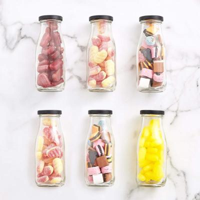 China Sustainable 300ml Fruit Juice Drinks Milk Glass Bottle Drinking Glass With Straw for sale