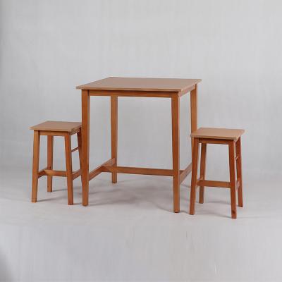 China Environmental friendly honey color simple solid wood dining table chair for two for sale