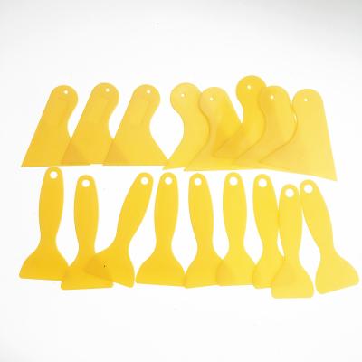 China Environmentally Friendly Plastic Tile Leveling System Putty Knife Hand Plastic Scraper for sale