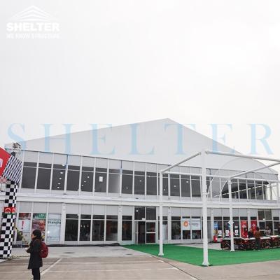 China Water Proof Double Shaped Large Platform Event Marquee Car Trade Show Exhibition Tent For Sale for sale