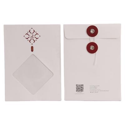 China Cheap white business envelope fashion kraft paper a4 envelope with shaped window for apparel shirt packing garment packaging with custom logo for sale