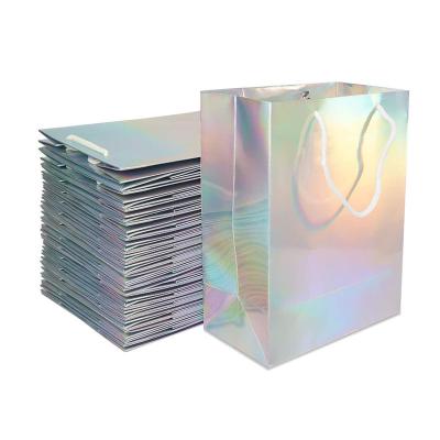 China Recyclable Manufactures Custom Colored Christmas Paper Rainbow Hardcover Book Bags Holographic Laser Gift Bag For Cosmetic Jewelry Gift Packaging for sale