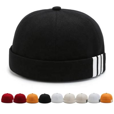 China Custom Made Brimless Hat 6 Panel Retro Black Red Cotton Vogue Men's Adjustable Brim Hat for sale