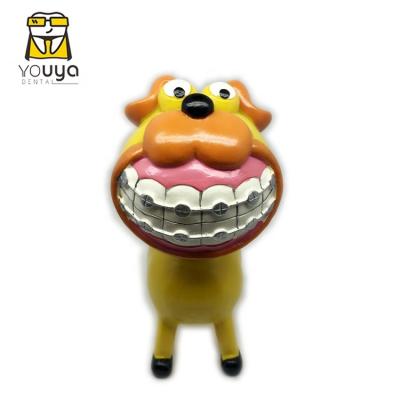 China China Funny Resin Dog Sculpture Toys Orthodontic Dog Tooth Gift for sale