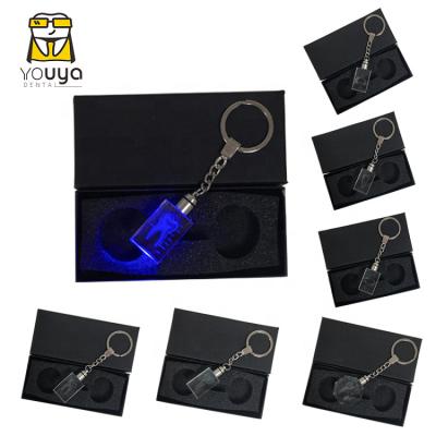 China Promotion Gift New Designed LED Light Crystal Dental Tooth Shaped Keychain for sale