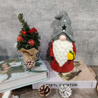 China Christmas Ornament Dolomite Santa Ceramic Candle Stand Gnome Statue Candle Holder for sale