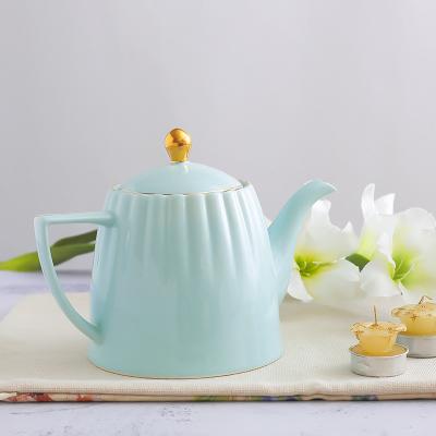 China Viable Factory Custom Colorful Teapot Good Quality Ceramic Embossed Teapot With Gold Rim for sale