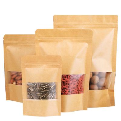 China Recycled Materials Brown With Window Stand Up Resealable Handle Pouches Coffee Tea Bean Candy Packaging Food Kraft Paper Bags for sale