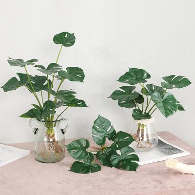 China Yiwu Natural Plant Touch Decoration Artificial Flower 6 Head Wholesale Nordic Outdoor Wedding Green Plant Philo Split Leaf for sale