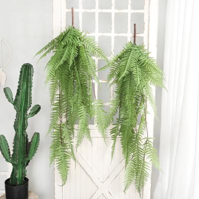 China Yiwu Beautiful Leaf Fern Plant Artificial Green Plant Wall Hanging Colorful Wholesale Artificial Plastic Wedding Decoration for sale