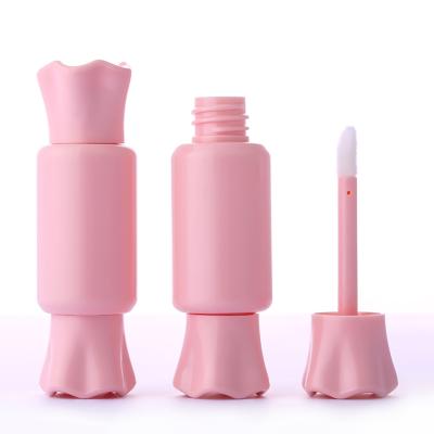 China Wholesale Custom Cute Empty Plastic 12ml Mini Candy Cosmetic Shaped Lip Gloss Tube Container With Magic Wand for sale