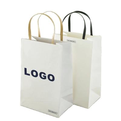 China Recyclable High Quality Custom Logos Paper Bags Gift Bag Designs And Bag for sale