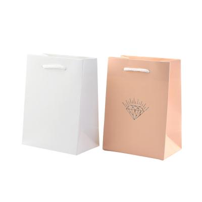 China Recyclable High Quality Custom Logos Paper Bags Gift Bag Designs And Bag for sale