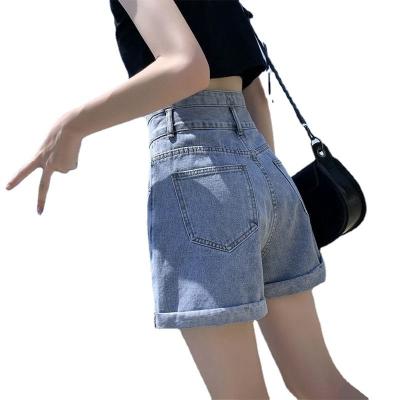 China Breathable super high waist denim shorts new style women's double button show leg trousers slim Korean loose wide hem volume hot pants for sale