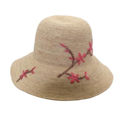 China High Quality Character Cloche Ladies Crocheted Raffia Straw Hats With Embroidery Flower For Women Beach Hat for sale