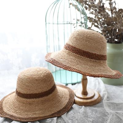 China New Plain Dyed Raffia Straw Hat Women Beach Hat High Quality Collection Crochet Raffia Hat Soft Foldable for sale