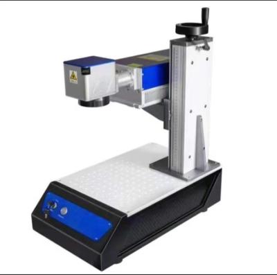 China 8000mm/s Velocidad 20W UV Laser Marker con sistema de control de PC para el marcado de precisión en venta