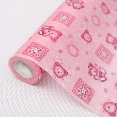 China Cartoon Ready To Ship Printed Cartoon Backing Non Woven Fabric For Gift Flower Wrapping for sale