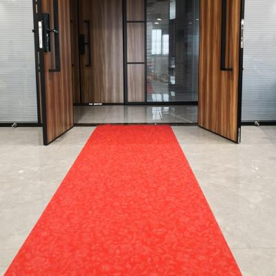 China Disposable Ready To Ship Non Woven PP/PET Wedding Ceremony Red Carpet 61cm*5y for sale